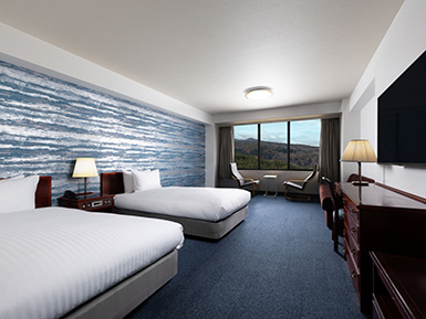 Standard Triple: 2 single beds, 1 sofa bed, Ocean View